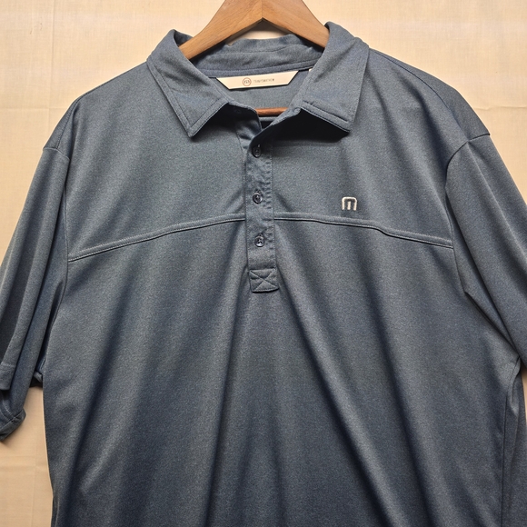 Travis Mathew Heathered Navy Short Sleeve Performance Polo - Picture 5 of 7